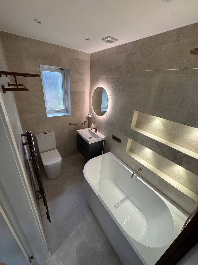 After: Panelled bathroom to large tiles and copper brassware, Aquafix Services Leeds