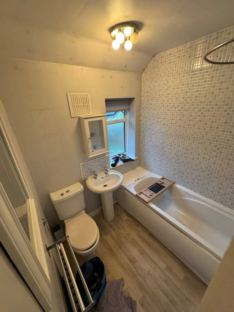 Before: Mosaic tiled bathroom to herringbone floor and shower bath