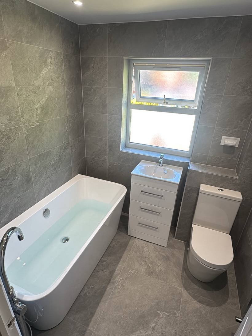 After: Corner shower room to a freestanding bath, Aquafix Services Leeds